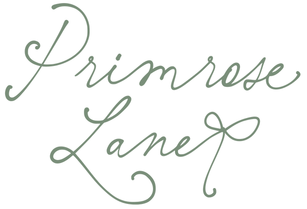 The words 'Primrose Lane' written in a flowing sage green cursive script on a solid white background.