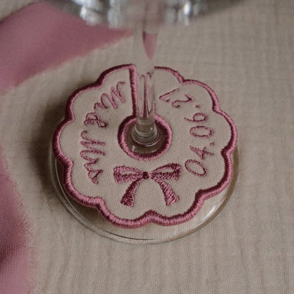 Pink personalised embroidered wine stem tag with scalloped border
