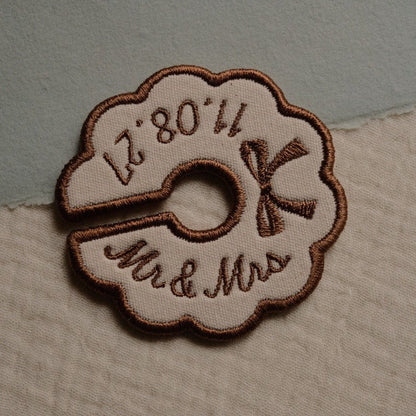 Neutral embroidered wine glass charm with custom wedding date and bow