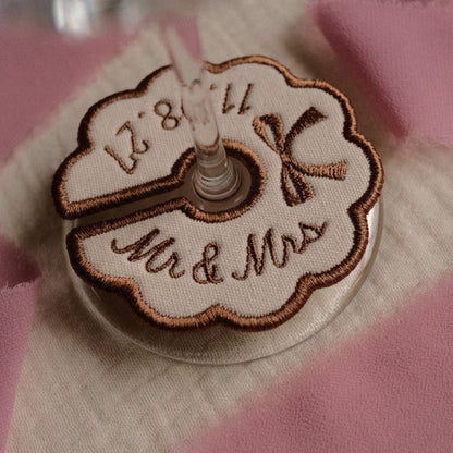Beige personalised embroidered wedding wine tag with bow details