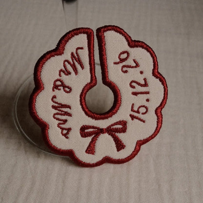 Burgundy embroidered wedding wine charm with custom names and date