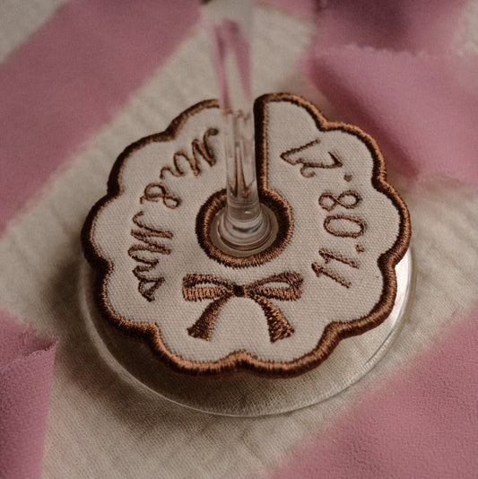 Personalised brown embroidered wine stem tag with custom wedding date and initials