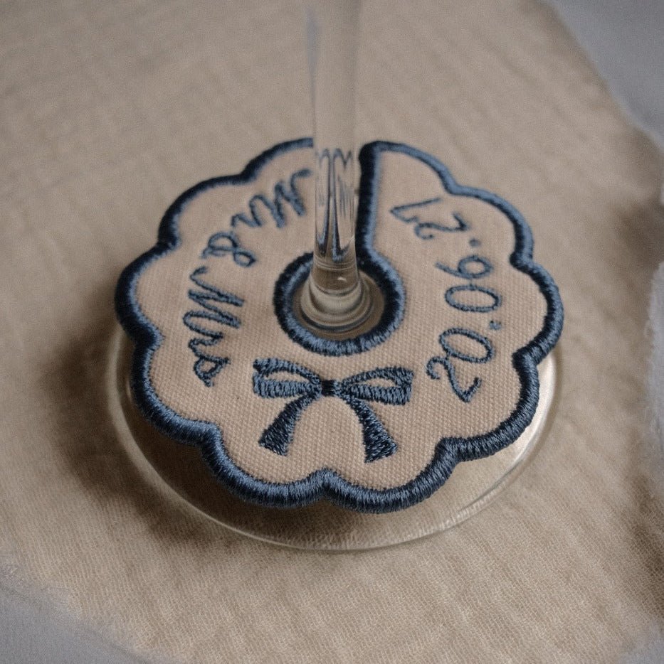 Blue personalised embroidered wine glass charm with custom wedding date and names
