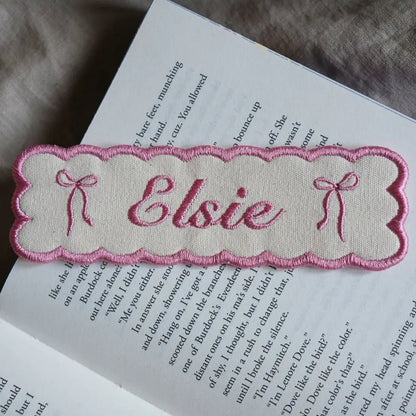 Custom embroidered name bookmark in rose.
